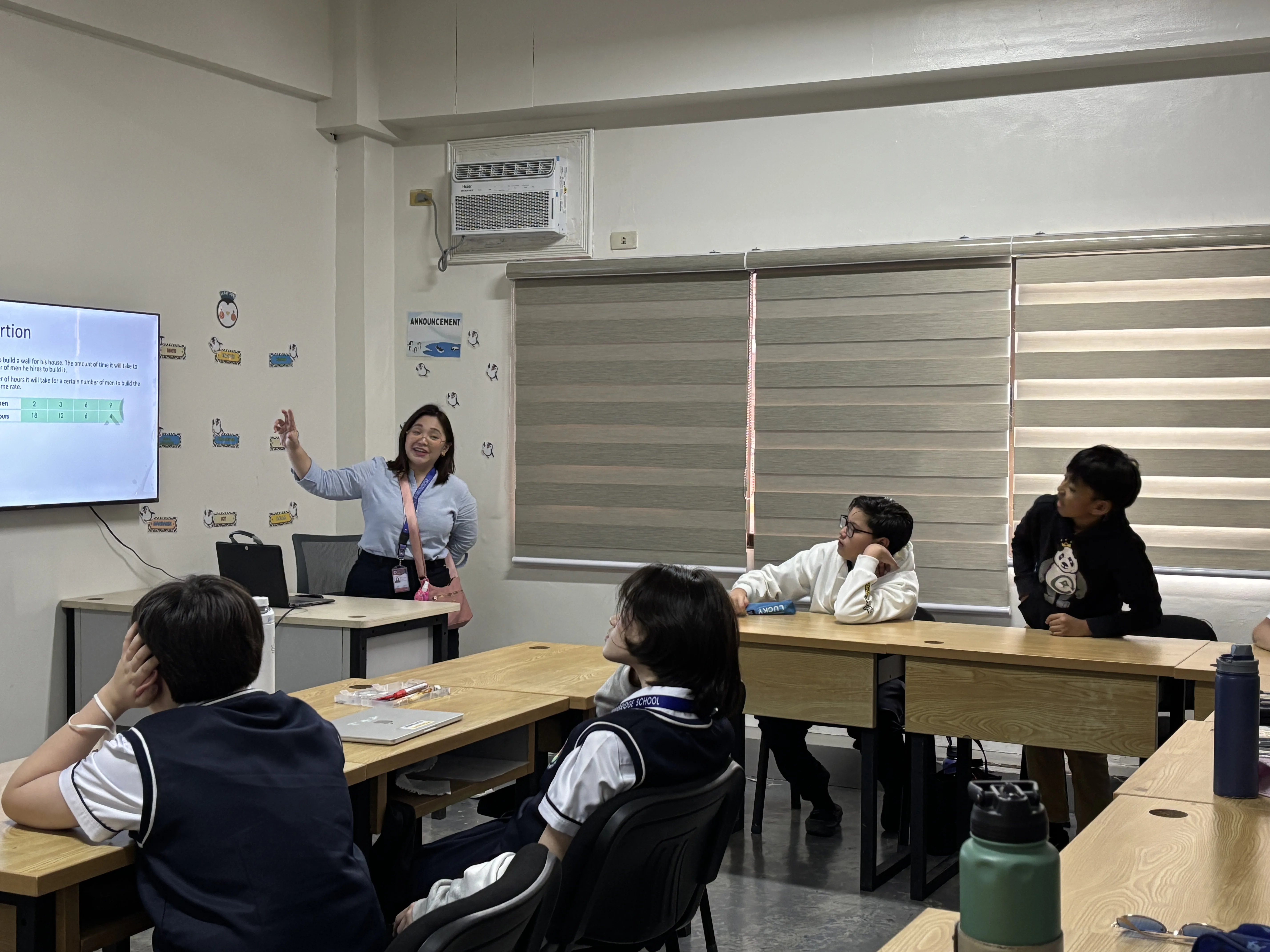Students collaborating on a project at Philippine Cambridge International School (PCIS), highlighting the school's emphasis on teamwork and hands-on learning experiences.