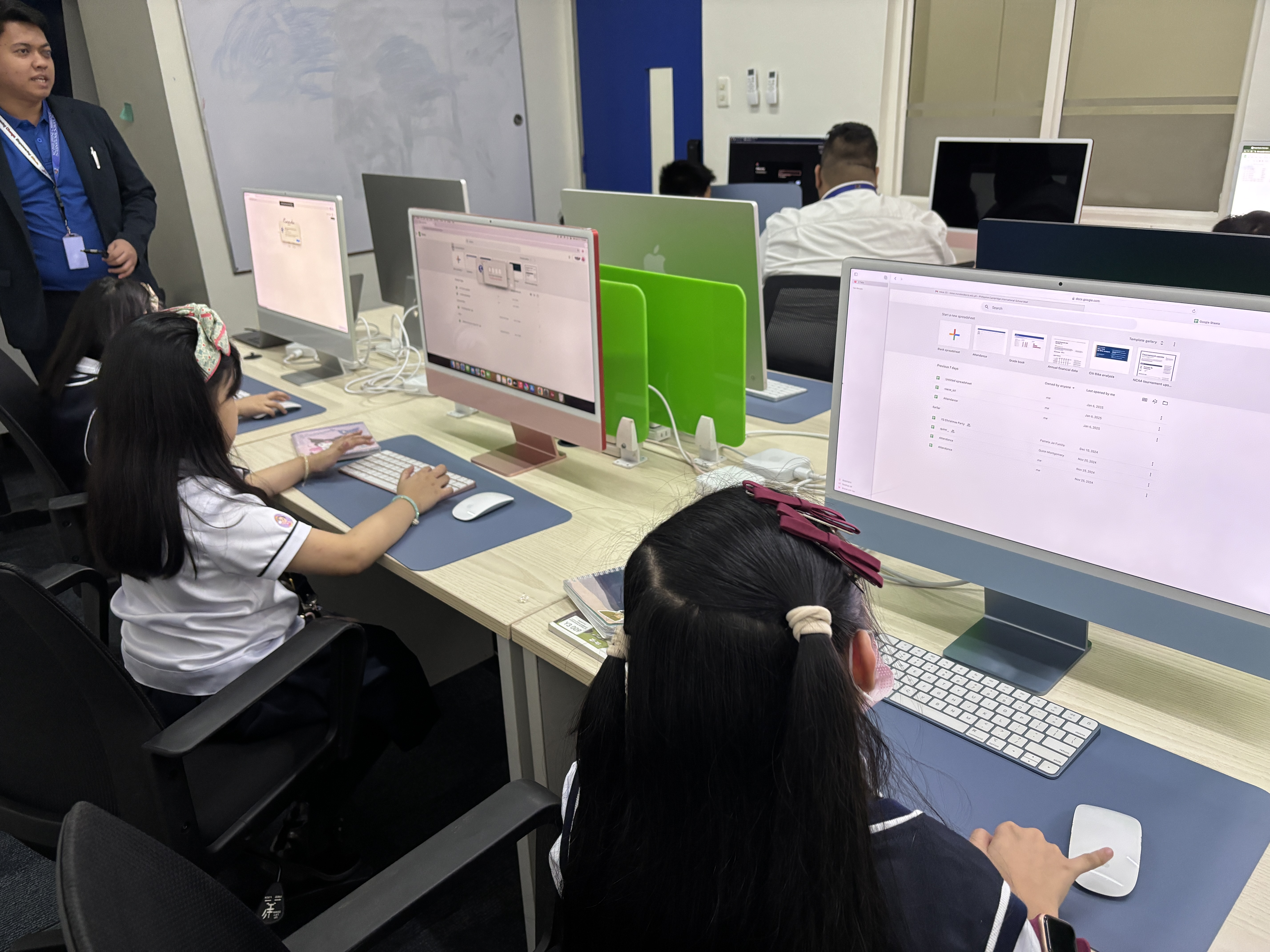 Students engaged in a classroom activity at Philippine Cambridge International School (PCIS), showcasing the school's interactive and student-centered learning environment.