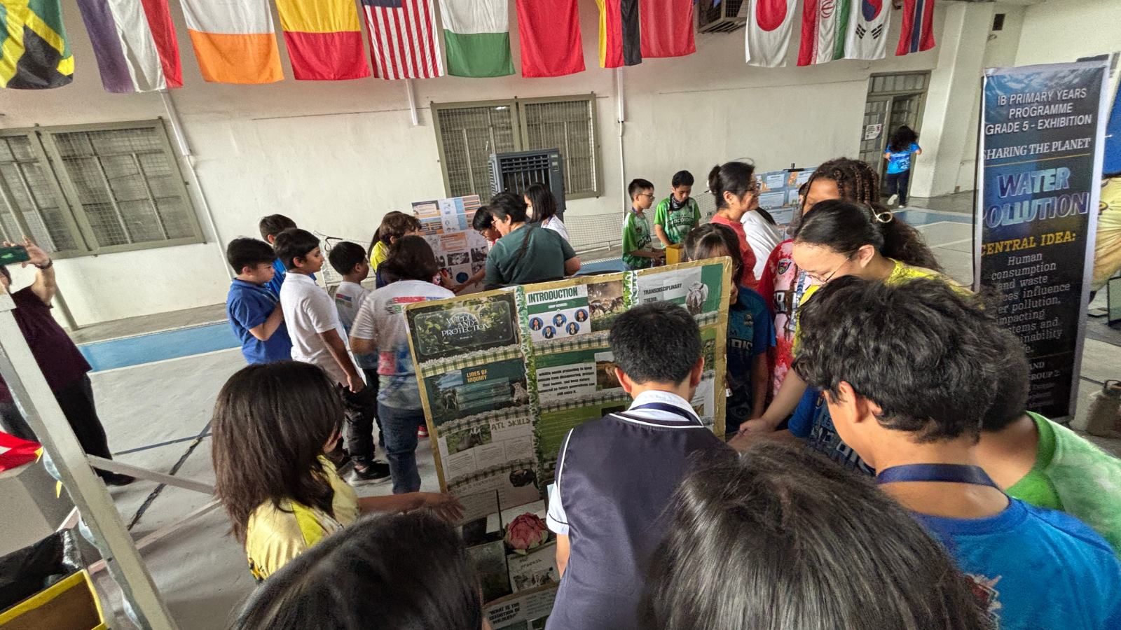  Students, parents, and educators explore inquiry-driven exhibition projects during an IB learning showcase at Philippine Cambridge International School, reflecting collaboration, research, and global-minded learning.