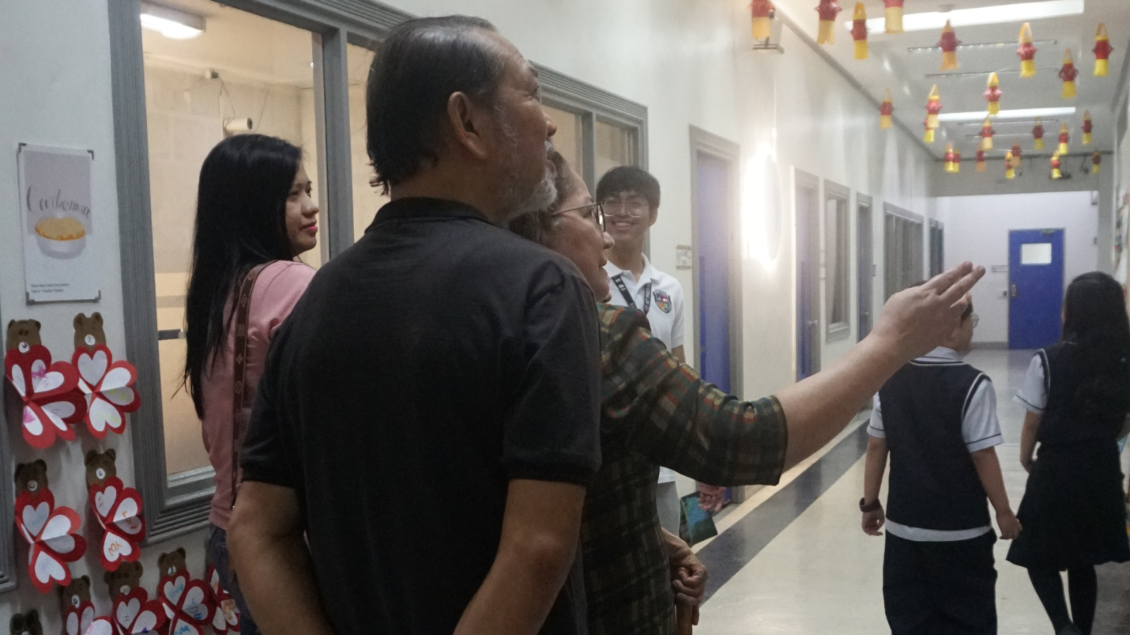 Prospective parents and family members explore the Philippine Cambridge International School campus in Cavite during a guided school tour, experiencing the welcoming learning environment, modern facilities, and International Baccalaureate (IB) school community while learning more about student life and personalized education.